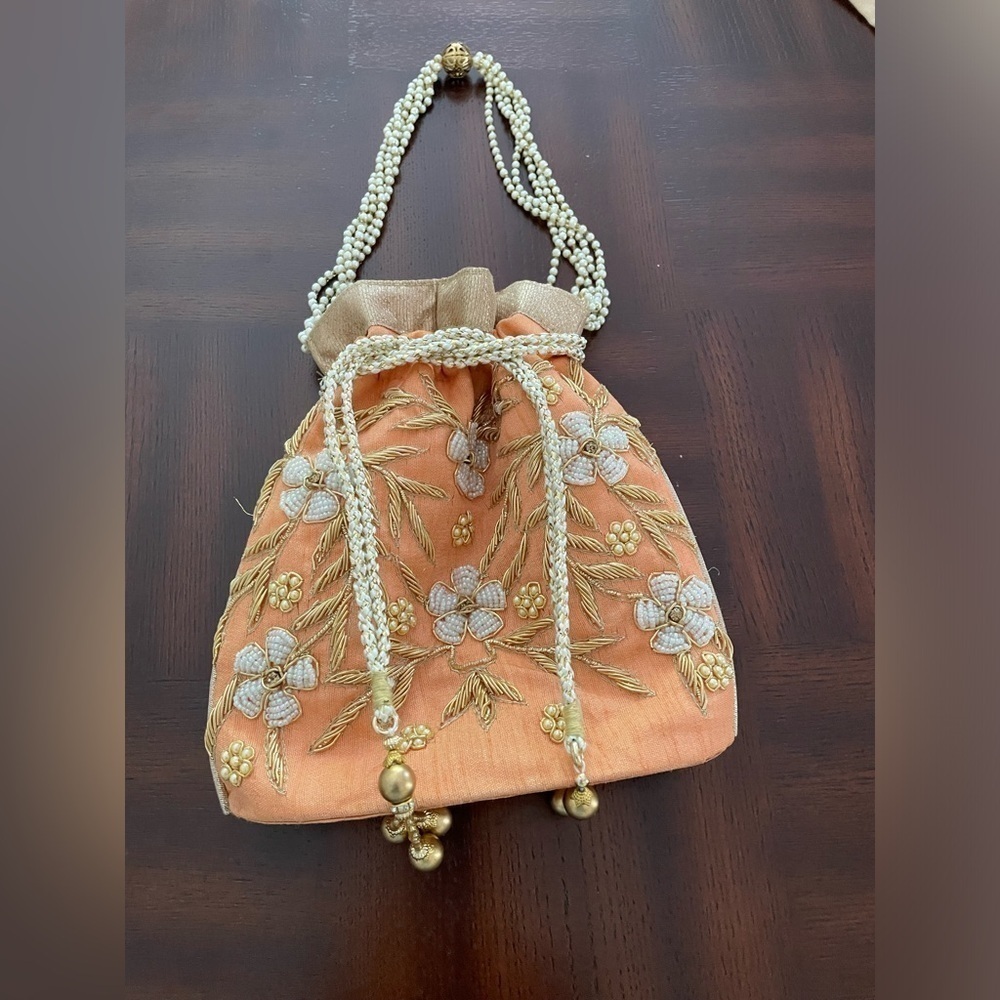 Women’s Luxuries Pearl &glass beads embellished potli bags in peach color